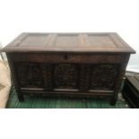 Eighteenth century oak coffer, carved panels to front, 123 w 60 d x 71cm h.Condition ReportSplit