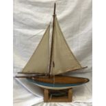 Model wooden pond yacht "Sting Me", hull length 44cms x 10.5cms w. Overall height to mast approx