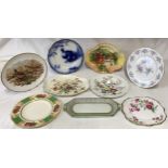 A collection of 9 plates of various sizes and design by Royal Doulton, Crown Ducal, Booth, Spode