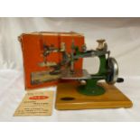 A Grain sewing machine with original box.Condition ReportBox a/f.