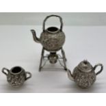 Miniature Chinese silver teapot, kettle on stand and sugar bowl with prunus blossom decoration