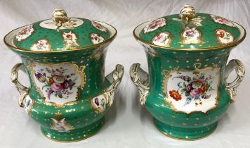 A pair of large 19thC continental ice pails with floral panels on a emerald green and gold