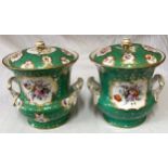 A pair of large 19thC continental ice pails with floral panels on a emerald green and gold