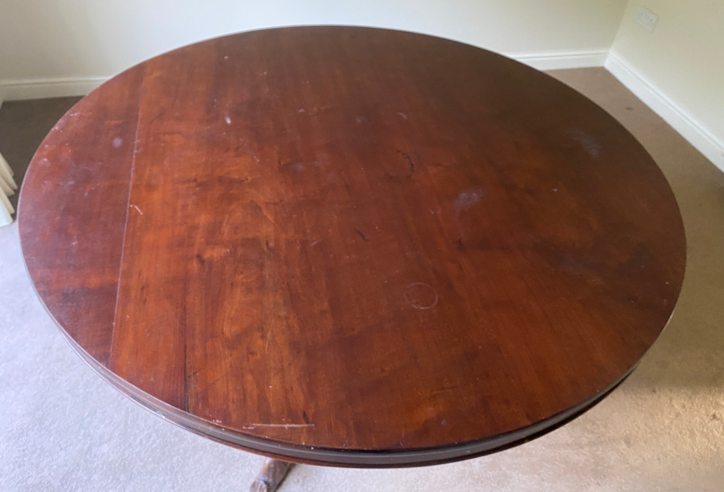 A mahogany Victorian tip top dining table on turned legs and tripod base. 132 diameter x 77cm h. - Image 3 of 9