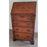 A 20thC mahogany bureau. 97 h x 55 w x 42cm d.