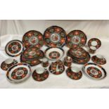 A large collection of Arita Imari Dynasty pattern plates comprising large platter 29.5cm d, 7 x