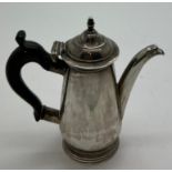 Miniature silver coffee pot circa 1740, maker J.S. 7cm h with ebony handle.Condition ReportSlight