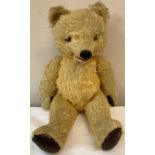 An early 20thC mohair teddy with opening mouth mechanism. 38cm h.Condition ReportMechanism needs