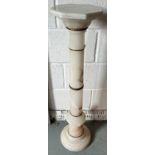 Marble torchere. 99 h x 21.5cm d.