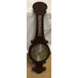 An oak cased wall mounted barometer by Proust Bros Hull, 90cm h x 28cm w. Dial 19.5cm d.Condition