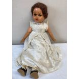 A Belgium jointed wooden doll numbered 68 to head with sleeping eyes, 62cm l.Condition