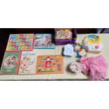 A collection of child?s toys and jigsaws to include fisher price musical toys, chatterbox book,