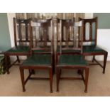 Six Maple and co, mahogany dining chairs on square, tapered legs with green leather seats.