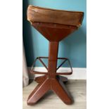 An Art Deco bar stool with upholstered top. 74 cm h.Condition ReportHoles to tops.