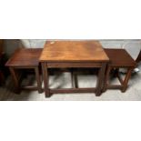 An oak nest of 3 tables, 2 under 1, largest 61 w x 38 d x 48cm h.Condition ReportSlight fading to