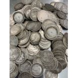 A large quantity of pre 1920 silver three pences, weight 236gm; plus a bag of 1920-1940 three