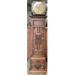 A Maple of London carved oak longcase clock, with three train movement and Westminster chime.