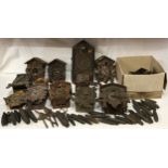 Box of 12 Cuckoo Clock Frames incl weights, pendulums etc for spares and repairs.Condition