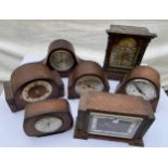 Seven wooden mantel clocks with movements. Spares/repairs.Condition ReportScratched, age related