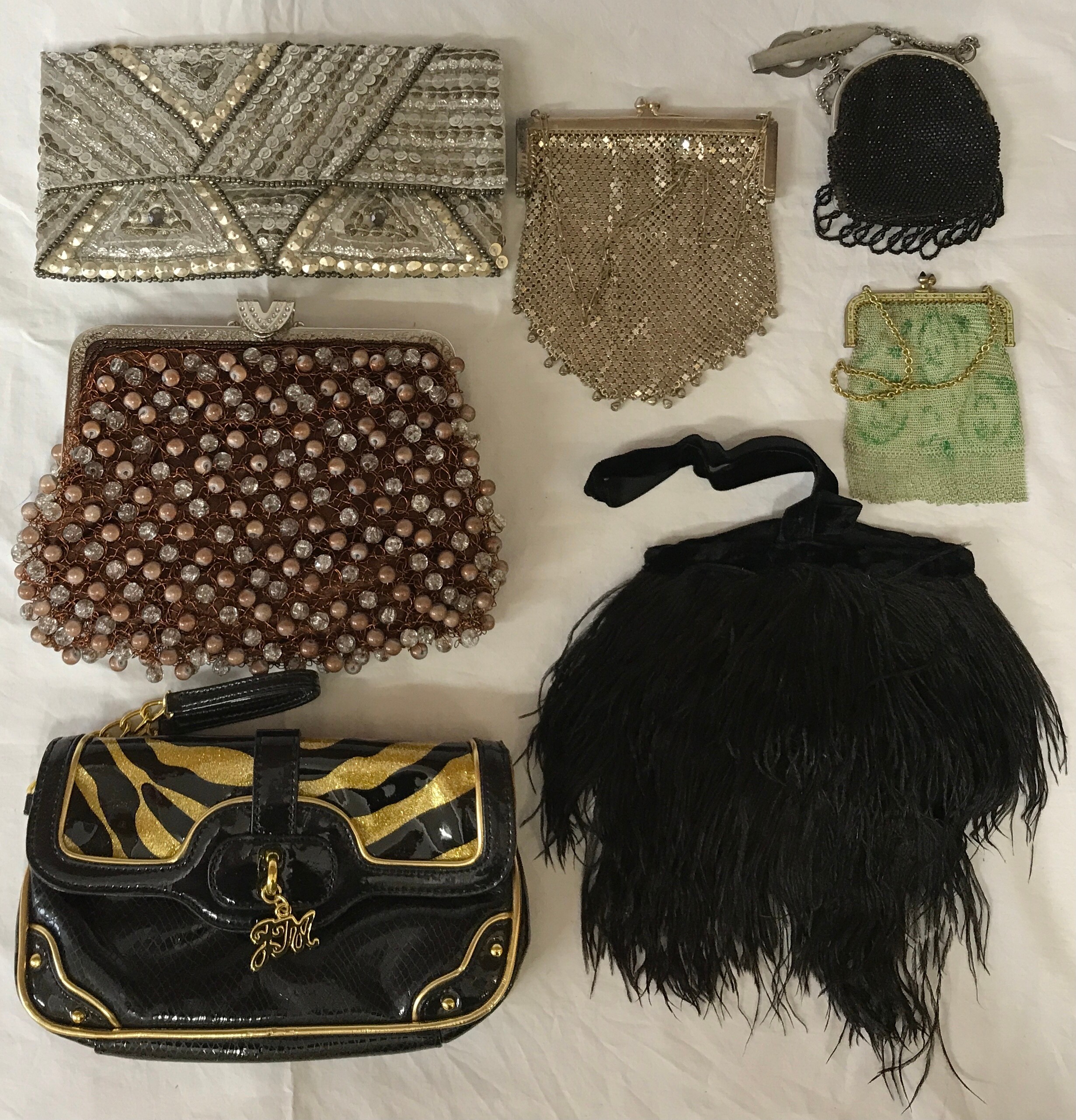 Collection of 7 purses and clutches to include Star by Julian McDonald, Accessorize, 2 chainmail