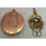 A 9ct gold photograph size locket together with a 9ct gold pendant. Total weight 11.7gm.Condition