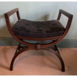 A 19thC mahogany upholstered topped stool. 71 h x 69 w x 47cm.Condition ReportRepair to base.