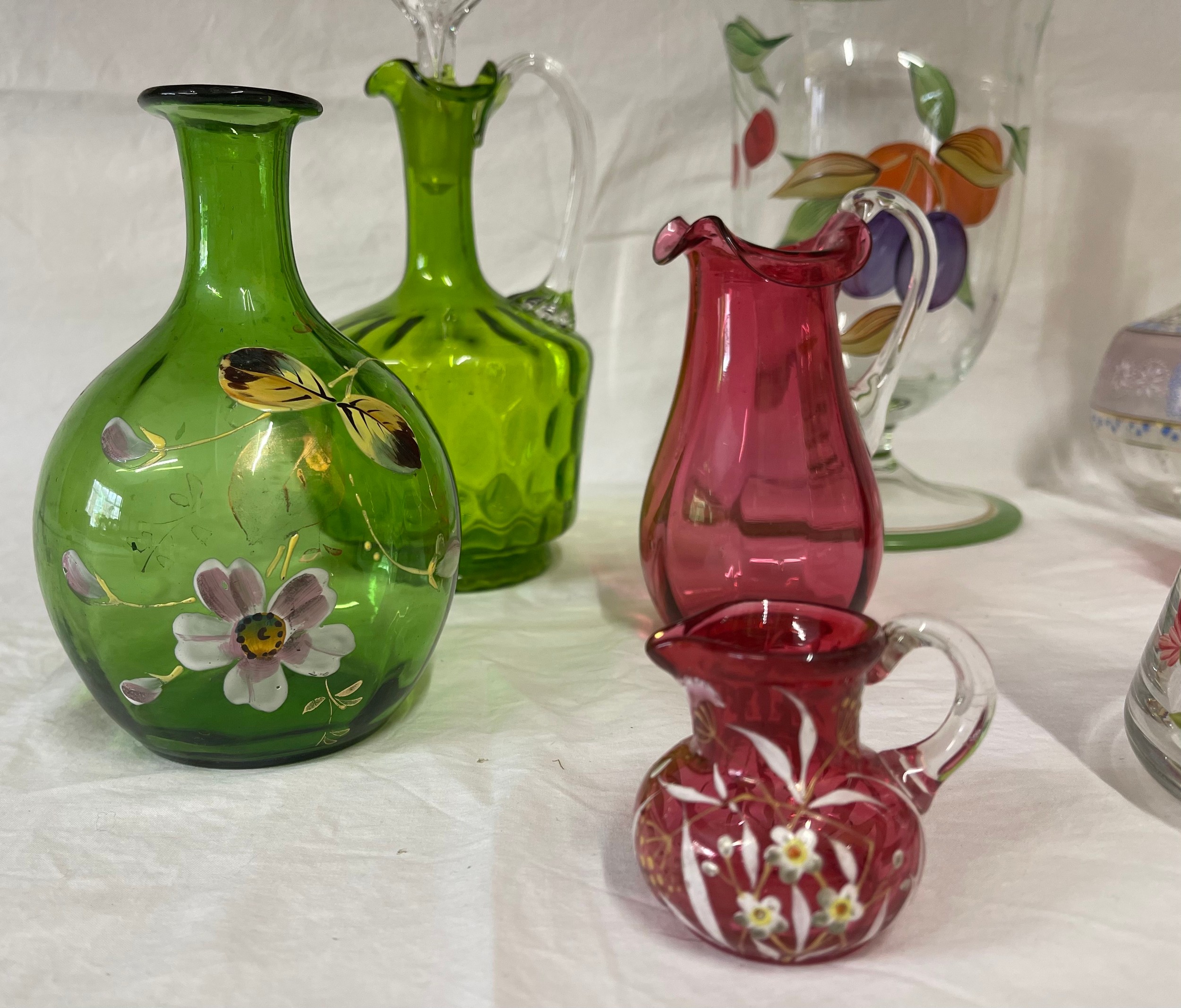 A selection of coloured and hand painted glass ware to include: 3 x cranberry jugs, 3 x green jugs - Image 4 of 6