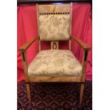 Arts and Crafts satin birch elbow chair inlaid with ebony. 103 h x 60cm w.Condition ReportVery