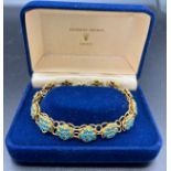 Yellow metal, tests as 22ct gold bracelet set with turquoise, total weight 24.1gm.Condition