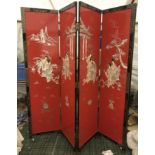 A large coromandel room dividing screen depicting oriental scenes. 183 h, four panels each 46cm w, d