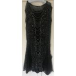 Costume to include 1920's beaded/sequinned dresses, cotton petticoats, beadwork belt and black