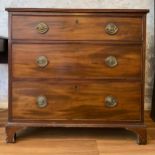 An early 19thC mahogany chest of drawers on bracket feet with brass handles.Condition ReportMarks to
