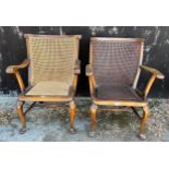 Two early 20thC cane seated and backed armchairs.Condition ReportAppear to be in good condition.