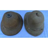 Two vintage pith helmets, Hawkes & Co Ltd, London and a Moores, London.Condition ReportUsed