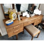 A G-Plan teak dressing table with triple mirror to top 150 w x 42 d x 122 h to top of mirror. 5