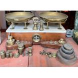 A 19thC pine scales with brass pans and marble top with a large quantity of mainly brass weights. 43