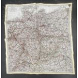 A silk scarf map of Germany showing International borders. 20 x 19cm.Condition ReportFrayed edges.