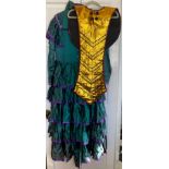 A green and purple Victorian style stage costume with bonnet together with a gold collar section for