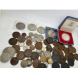 A quantity of mainly British coinage to include Cartwheel pennies, crowns etc.