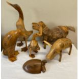 Six various rustic wooden figures to include penguin, duck, pig etc. Duck 45cm h.Condition