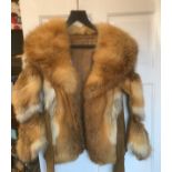 Fox fur and Suede jacket measuring 48cm wide armpit to armpit. Initials SMF embroidered inside