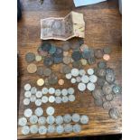 A collection of mostly One Shilling and Sixpence coins dating before 1947 and other coins and