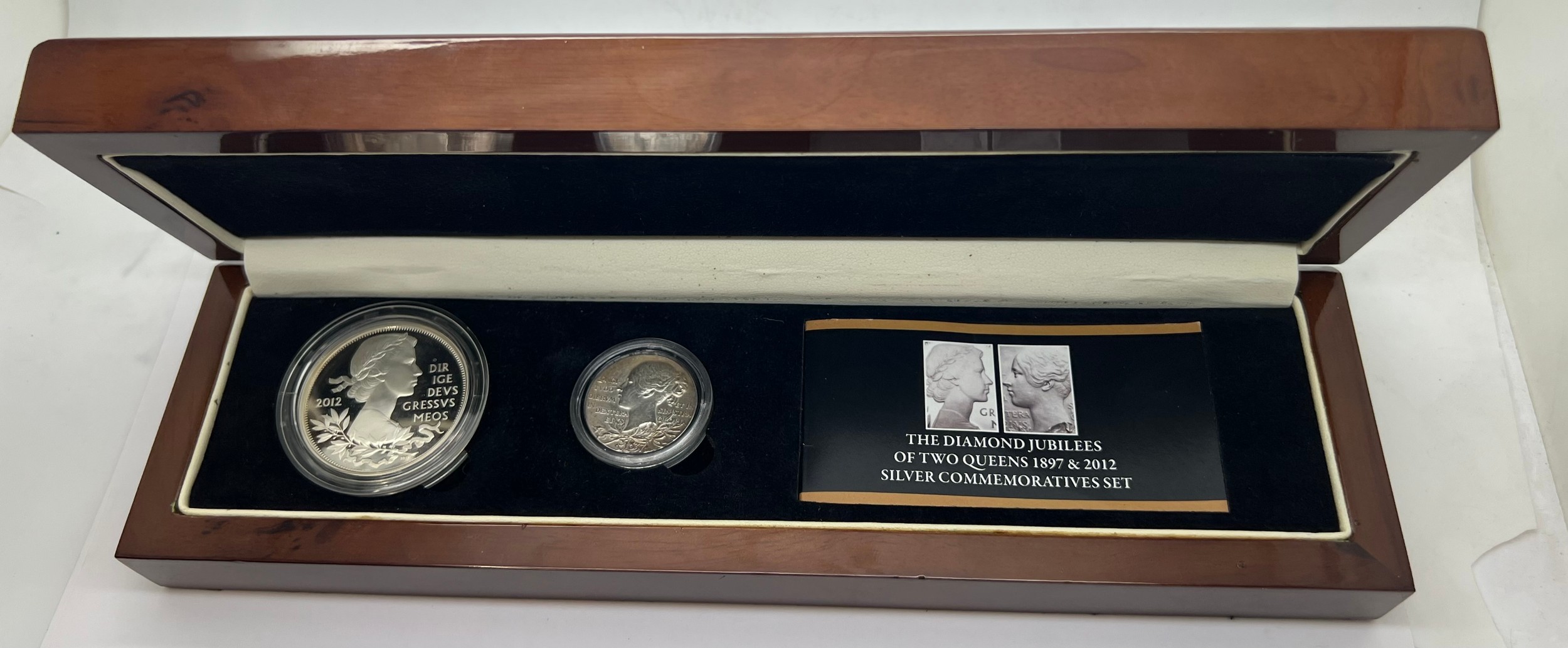 London Mint Office The Diamond Jubilees of Two Queens, 1897 and 2012 silver two crown set, in deluxe