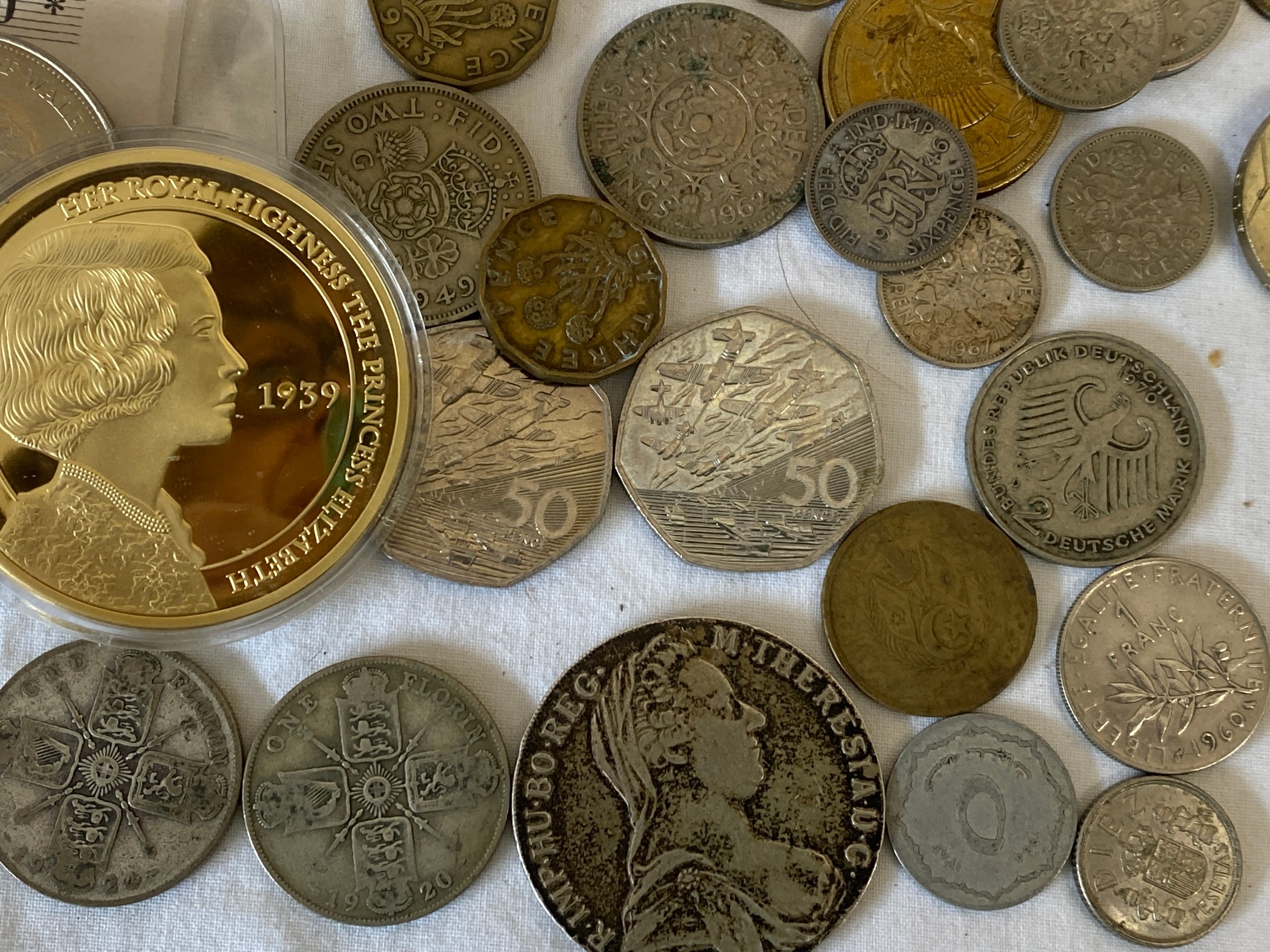 A collection of various coins to include Silver 1780 Maria Theresa Thaler coin, Two Florins 1919 and - Image 2 of 3