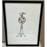 A mounted and framed Quentin Blake signed and stamped limited edition print 7/250 "Balancing Act"