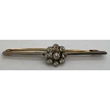 An unmarked yellow and white metal diamond set bar brooch 6.5cm l.Condition ReportCrack to gold