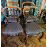 Four 19thC balloon backed dining chairs on cabriole legs with upholstered seats.Condition ReportGood