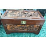 Camphor wood chest with oriental carvings to top and all sides, 100 l x 53 w x 58cm h.Condition
