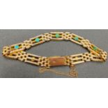 A 9ct gold gate bracelet set with turquoise, total weight 13.6gm.Condition ReportTurquoise