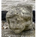 An early stone carving of a head, probably medieval. 23 h x 21 w x 35cm d.Condition ReportWorn